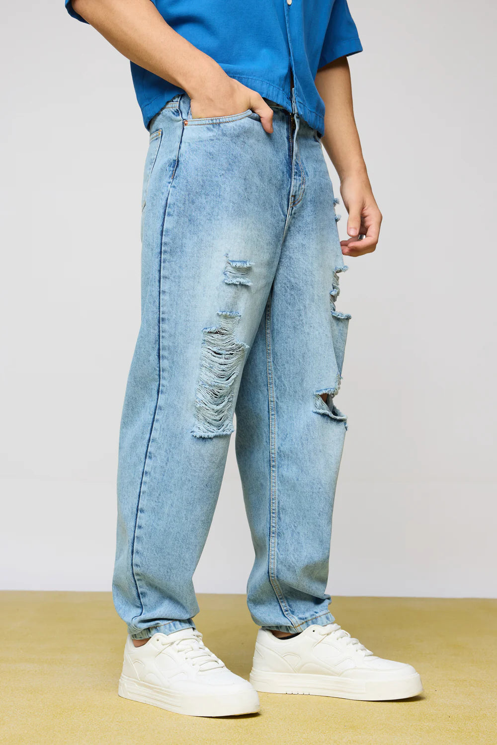 Trendy True Blue Distressed Men's Slouchy Fit Jeans with Relaxed Streetwear Style