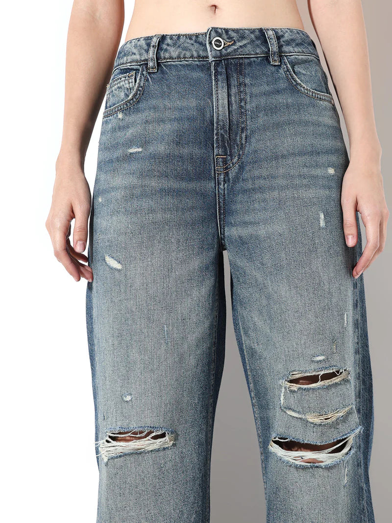 Modern Women’s Blue Distressed Jeans with Intricate Embroidered Details for Stylish Casual Outfits