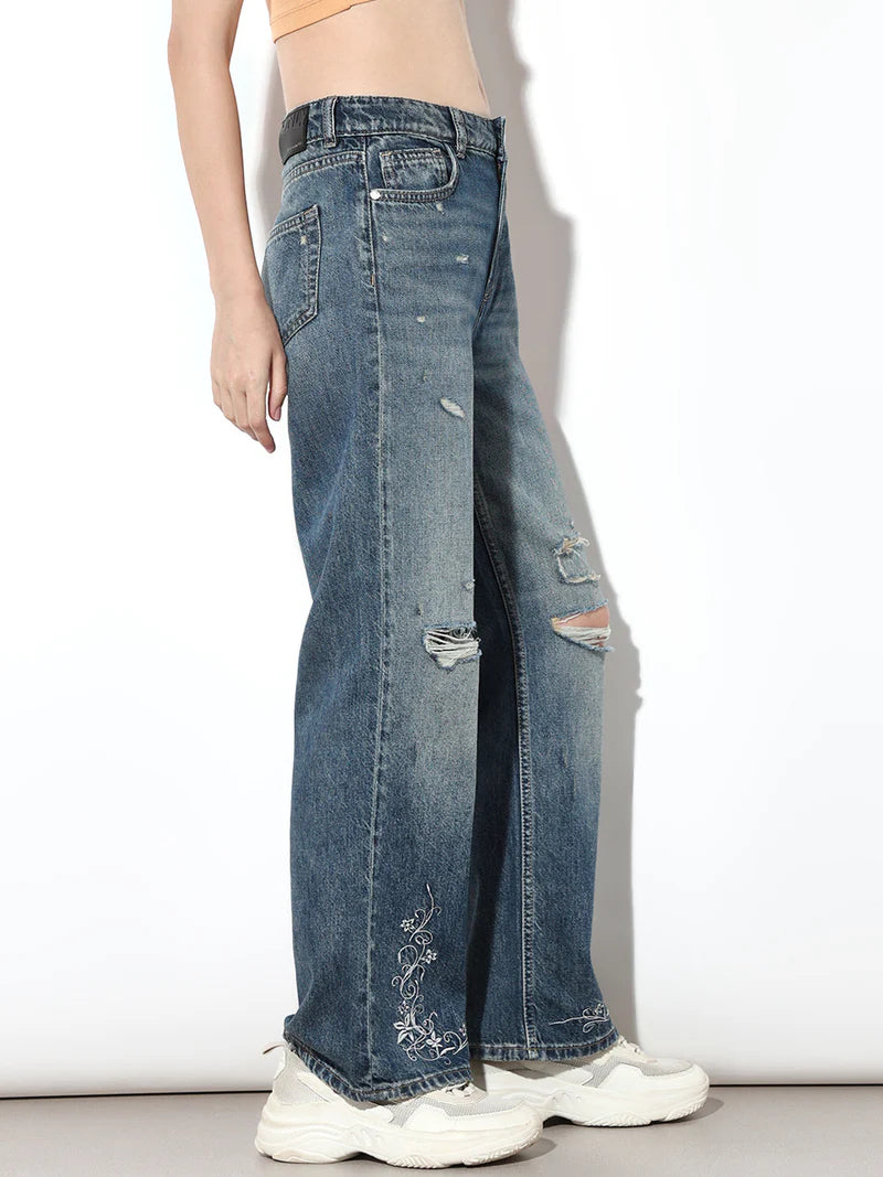 Modern Women’s Blue Distressed Jeans with Intricate Embroidered Details for Stylish Casual Outfits