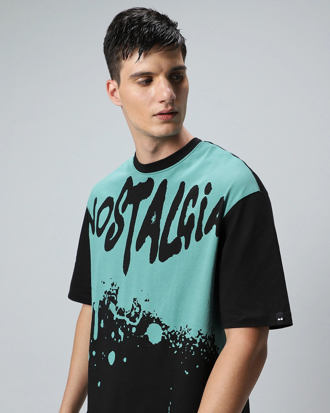 Bold Men’s Oversized Nost Graphic Printed Tee – Black & Green Edition