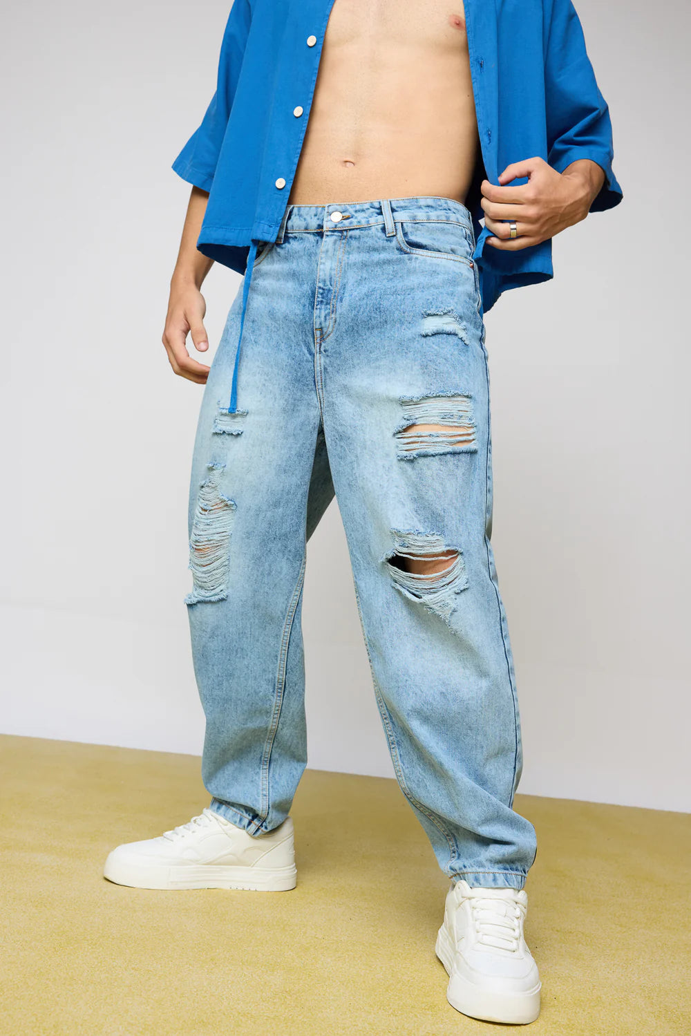 Trendy True Blue Distressed Men's Slouchy Fit Jeans with Relaxed Streetwear Style