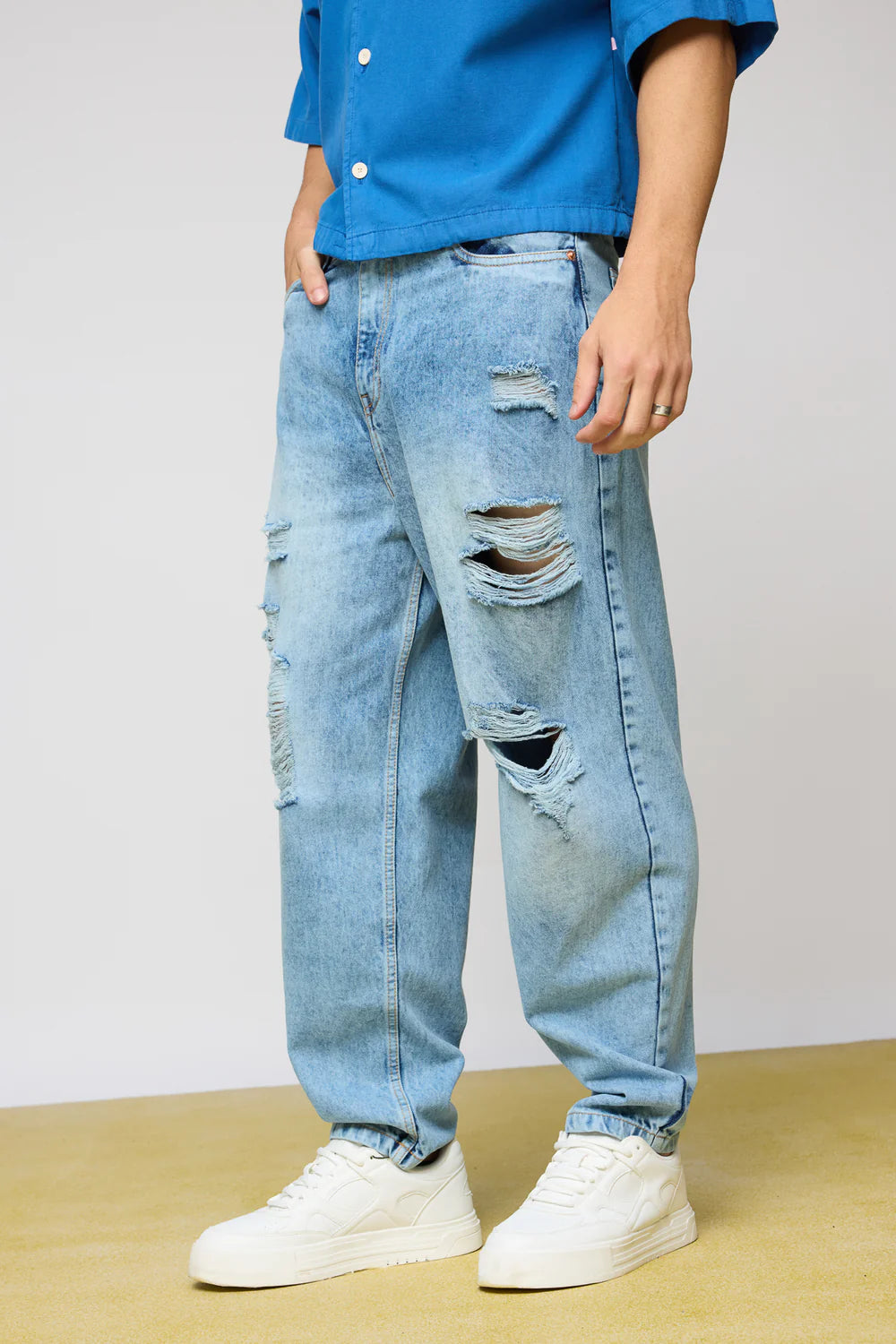 Trendy True Blue Distressed Men's Slouchy Fit Jeans with Relaxed Streetwear Style