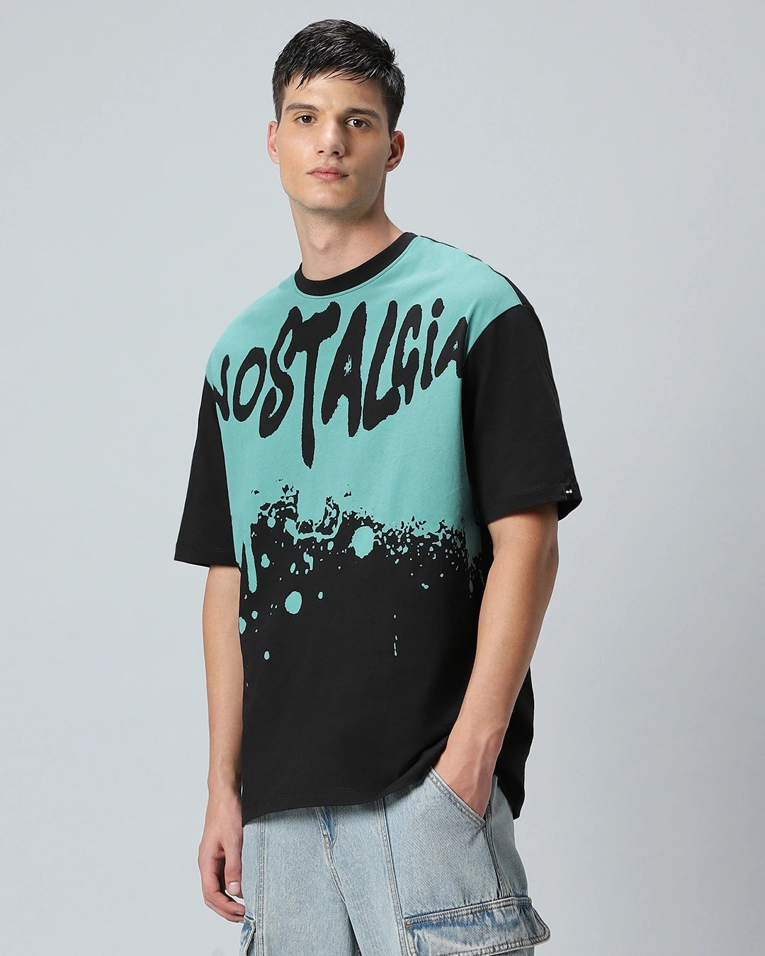 Bold Men’s Oversized Nost Graphic Printed Tee – Black & Green Edition
